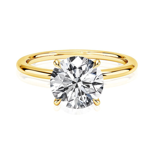 4 Prong Moissanite Solitarie Ring in S925 (1/20 14K GF)
