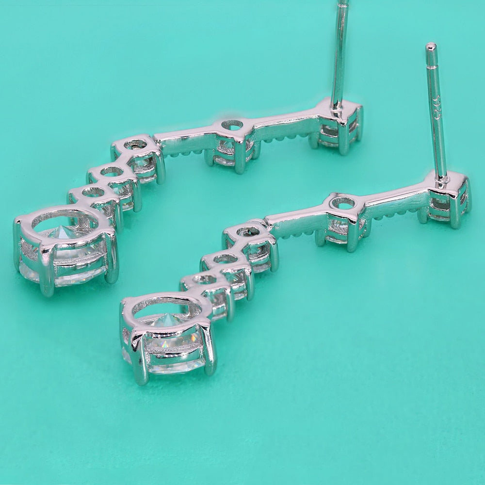 Pendientes largos con borlas de moissanita en plata de ley 925.