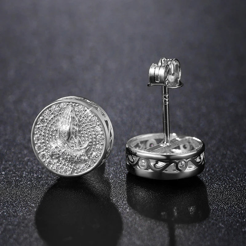 Pendientes de moissanita con manos en oración en plata de ley 925